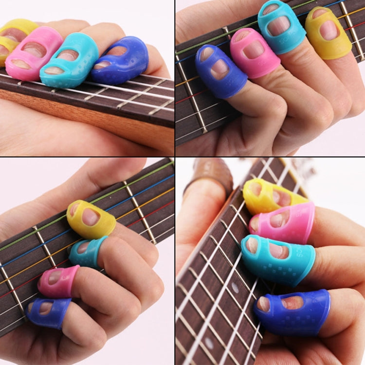 Assorted ukulele finger protector caps, size L, worn on fingers over instrument strings