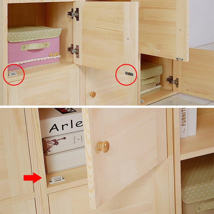 Plastic magnetic cabinet door latch installed on cabinet doors with metal plate