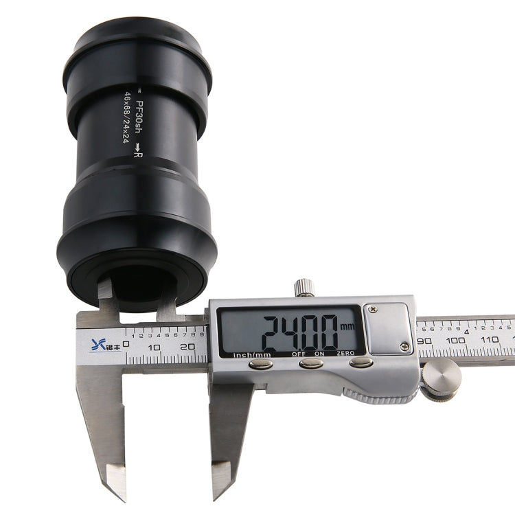 Black PF30 bottom bracket sleeve height measurement with calipers, “PF30SH” marking
