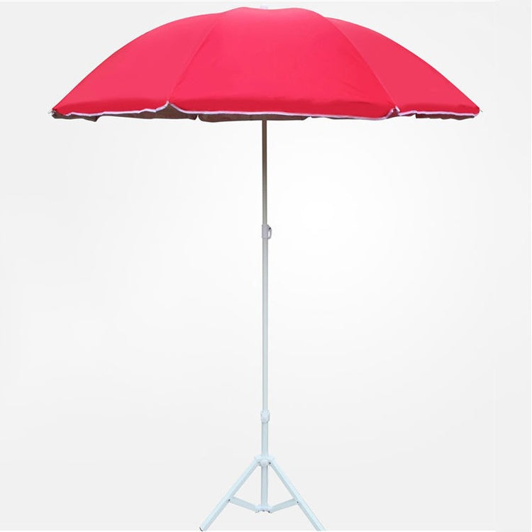 Red umbrella canopy on white tripod stand with cross folding base