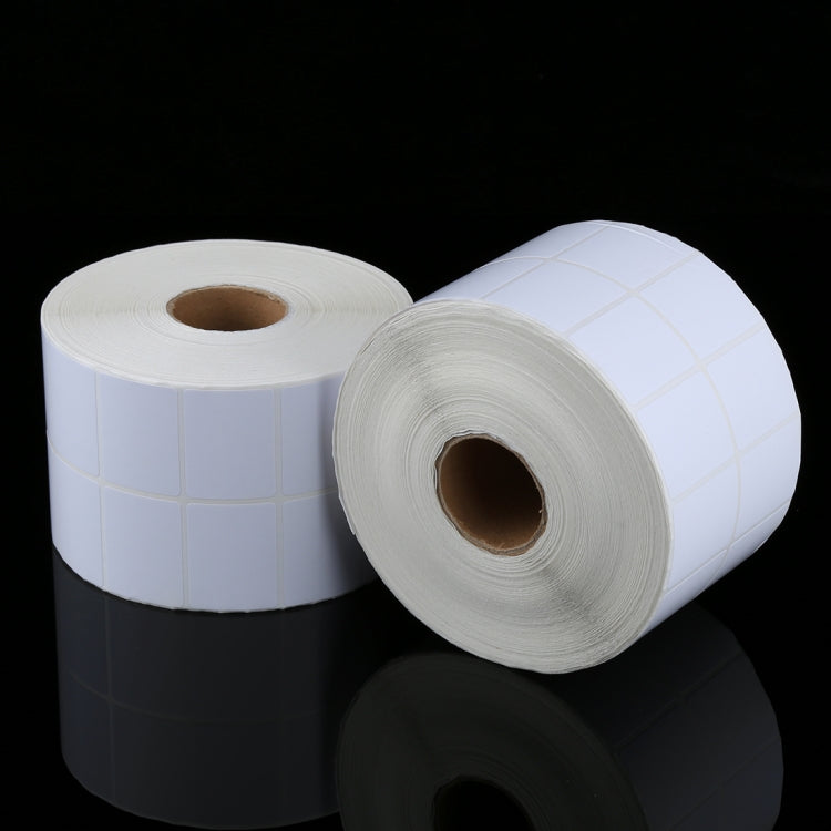 Two blank white label sticker rolls with 30x40mm rectangular labels