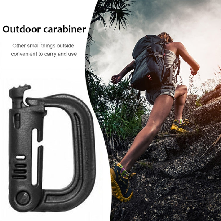 Plastic carabiner on backpack strap, curved gate and latch visible