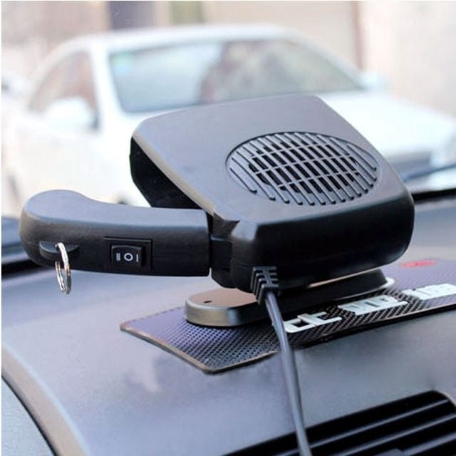 12V demister defroster fan attached near windshield with vented cover