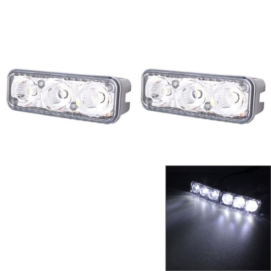Set of two rectangular clear-lens LED daytime running lights with gray mounting housings.