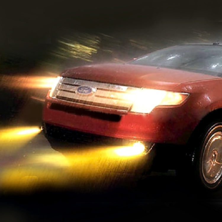 Front vehicle headlight beam with warm yellow light from H3 halogen bulbs