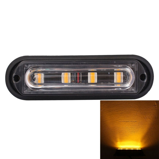 Car strobe warning light with clear lens and yellow LEDs on dark housing