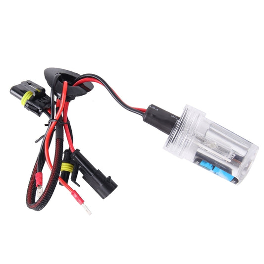 HID xenon bulb with attached wiring and black electronic module