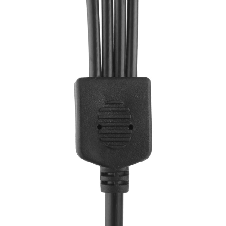 DC power connector plug with embossed symbol on black cable