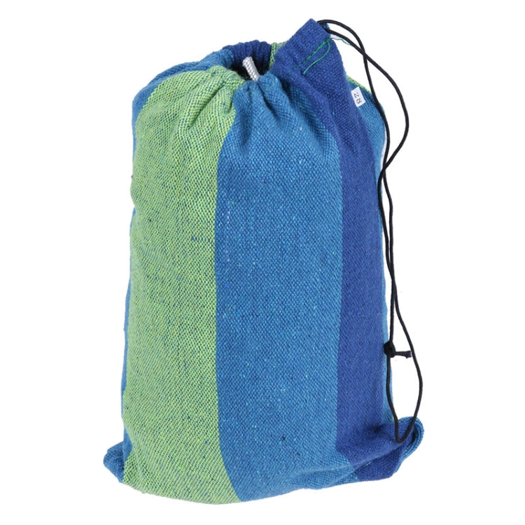 Striped hammock storage bag with blue and green fabric panels, drawstring.