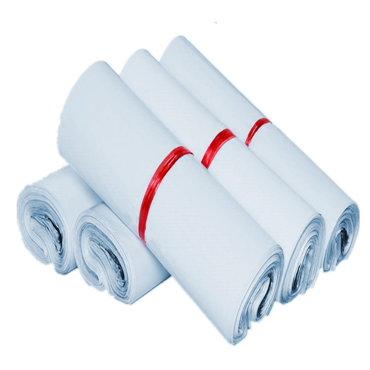 Rolled light blue mailing bags with red ties, air-cushion packing