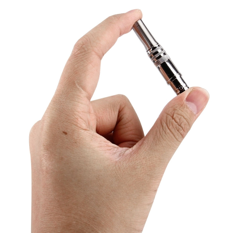 Straight female BNC connector held in hand, silver metal with knurled ring collar