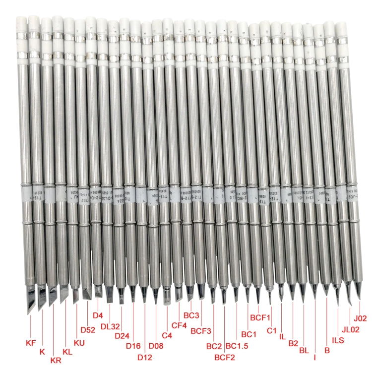 QUICKO T12 iron tip variety tray with many metal tips labeled by model codes.