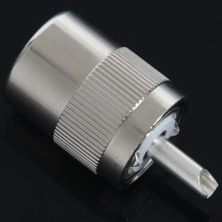 Male RF coaxial twist-on connector side view, knurled ring and pin opening