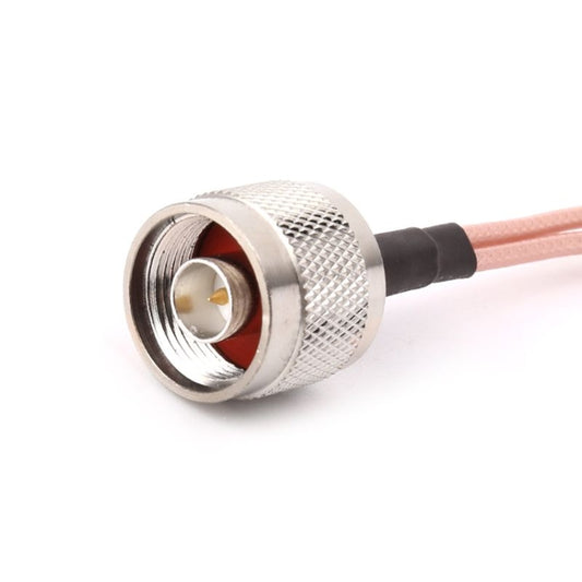 Silver N male coax connector on pink cable with black strain relief.
