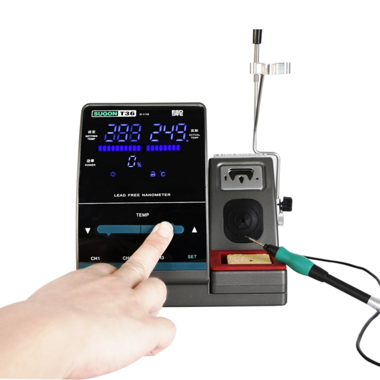 Soldering station control panel with hand pressing buttons and connected iron