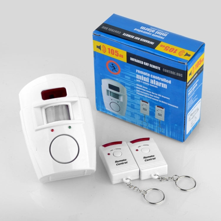 White motion detector alarm with two remote key fobs and retail box