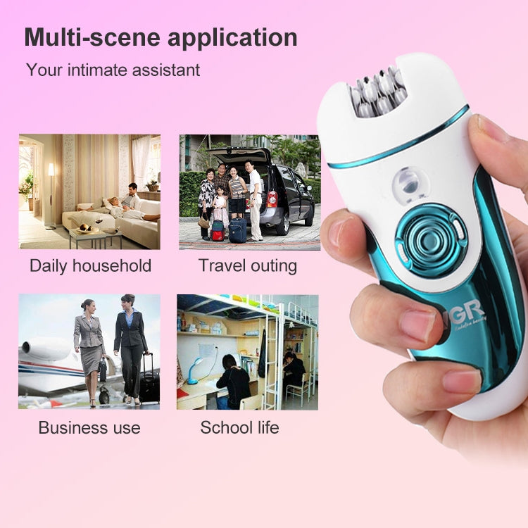 VGR V-700 electric hair remover in white and teal, held in hand