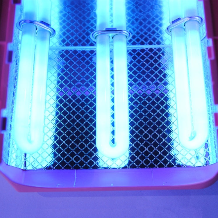 UV nail curing lamp with illuminated tubes inside the curing chamber