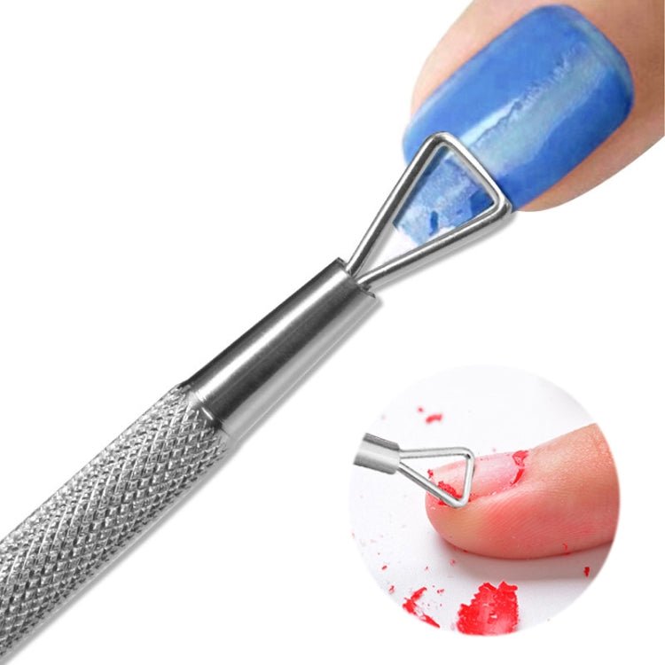 Stainless steel nail glue remover tool using fork tip on fingernail