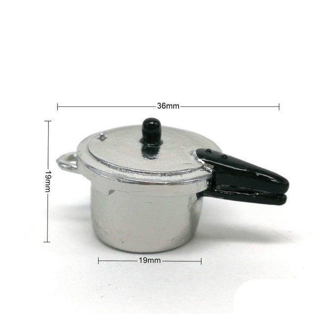 Mini metal pressure cooker toy with lid; 36mm length and 19mm base