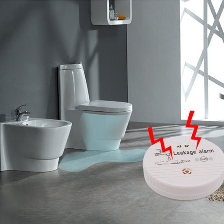 White round water leak alarm detector with red lightning icon