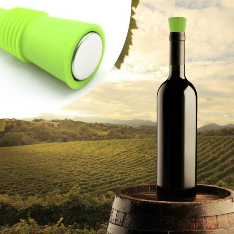 Green silicone wine bottle stopper on wine bottle neck