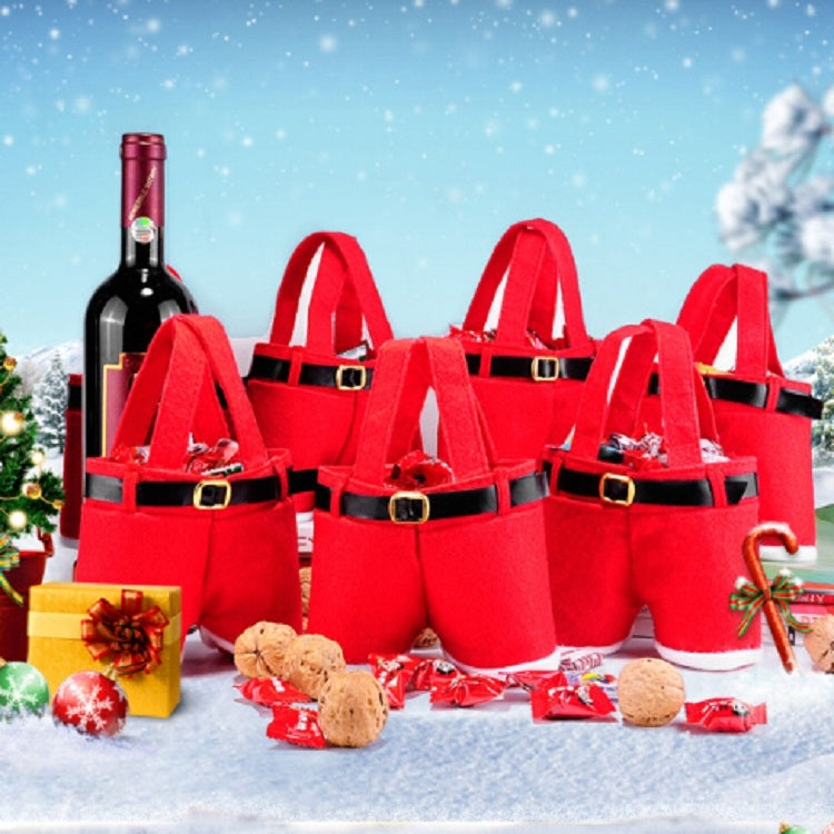Set of red felt bottle bags with black belts and gold buckles, one bottle included