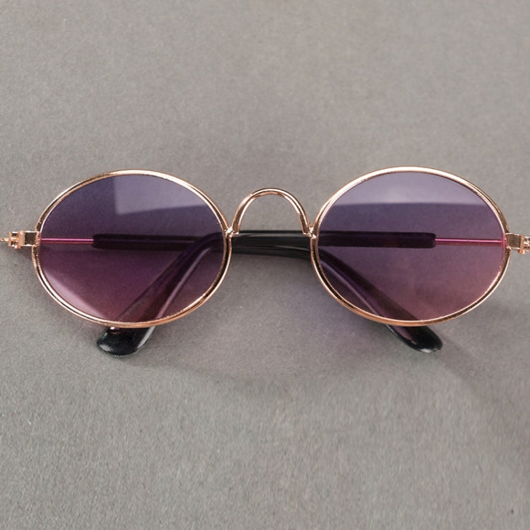 Pet sunglasses with round purple tinted lenses and rose-gold metal frames