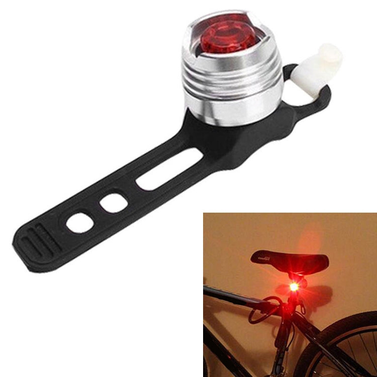 Bicycle rear LED tail light with silver housing, red lens, and black mounting bracket