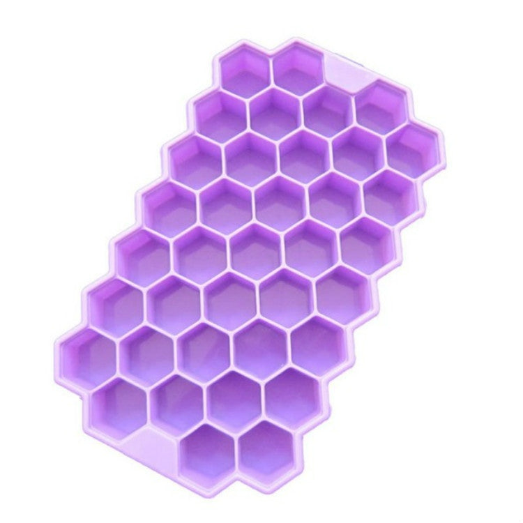Purple honeycomb ice cube mold tray with hexagonal cavities for freezer treats