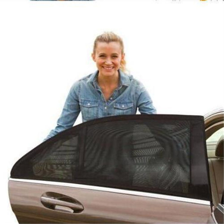 Car window mesh sunshade panel, dark black net screen cover held up for display