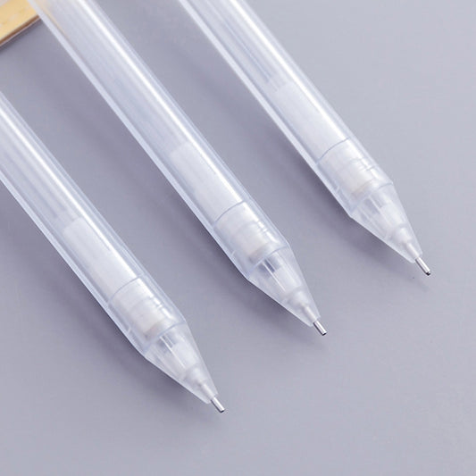 Three frosted transparent hexagon pencil pens with pointed white tips