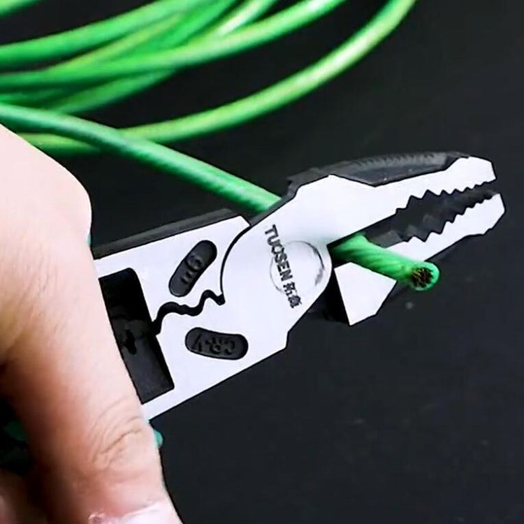 TUOSEN wire stripper pliers held by hand, white head with serrated jaws