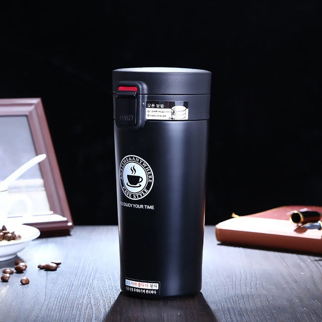 Black insulated stainless steel tumbler with flip lid and latch, 380 ml