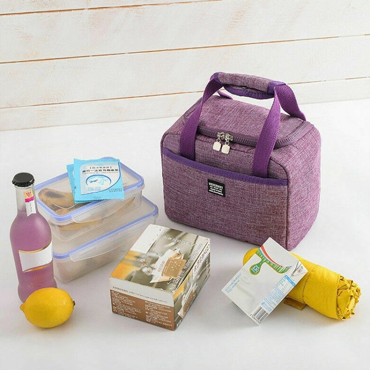 Purple insulated lunch bag with zipper top and carry handle with included lunch items