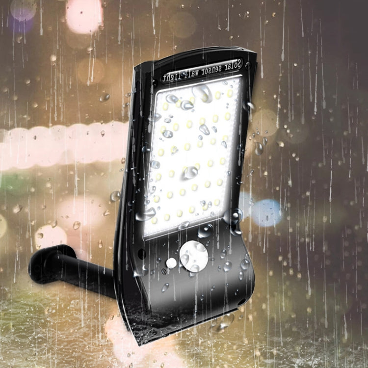 Waterproof solar wall light with LED panel and motion sensor in rain droplets