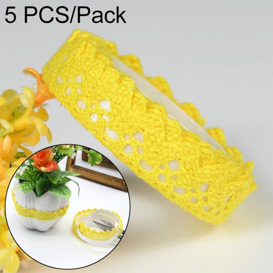 Yellow crochet lace adhesive tape roll with repeating cutout pattern
