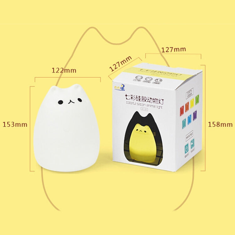 Cat night light with size dimensions shown beside the retail box packaging.