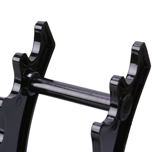 Black holder stand detail with side posts and two horizontal rods
