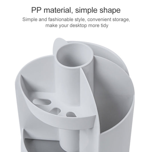 White multi-compartment rotating pen holder with angled slots for pens