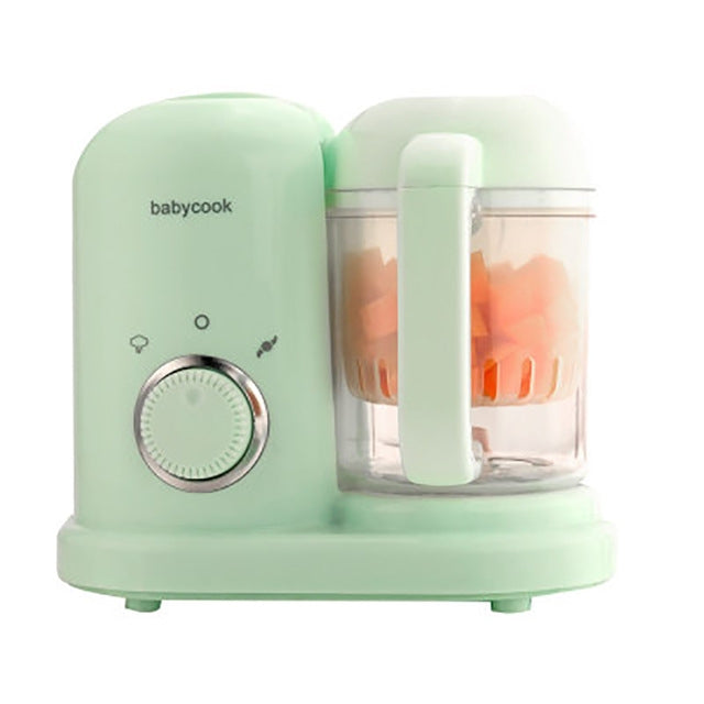 Green baby food steamer with transparent container and round control dial