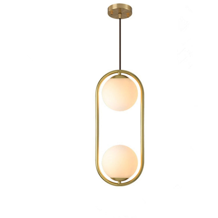 Copper oval-frame pendant with two lit round glass shades and top ceiling mount.
