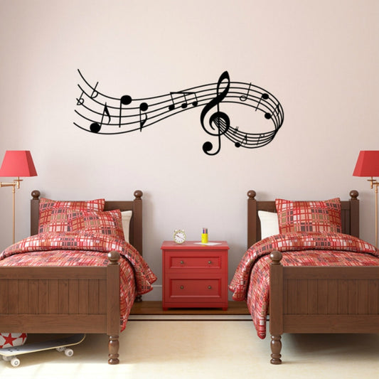 Black music note wall decal with treble clef and staff lines, long horizontal spread