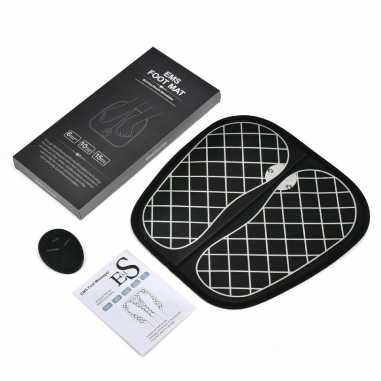 EMS foot massager kit: black mat with white grid, remote, manual, and accessories