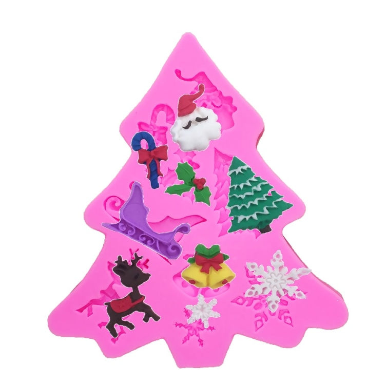 Christmas tree silicone mold with cavity inserts: colored figures, tree, and snowflakes.