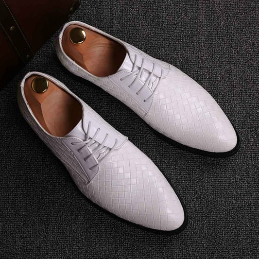 White crocodile-textured lace-up dress shoes with pointed toe and stitched detailing