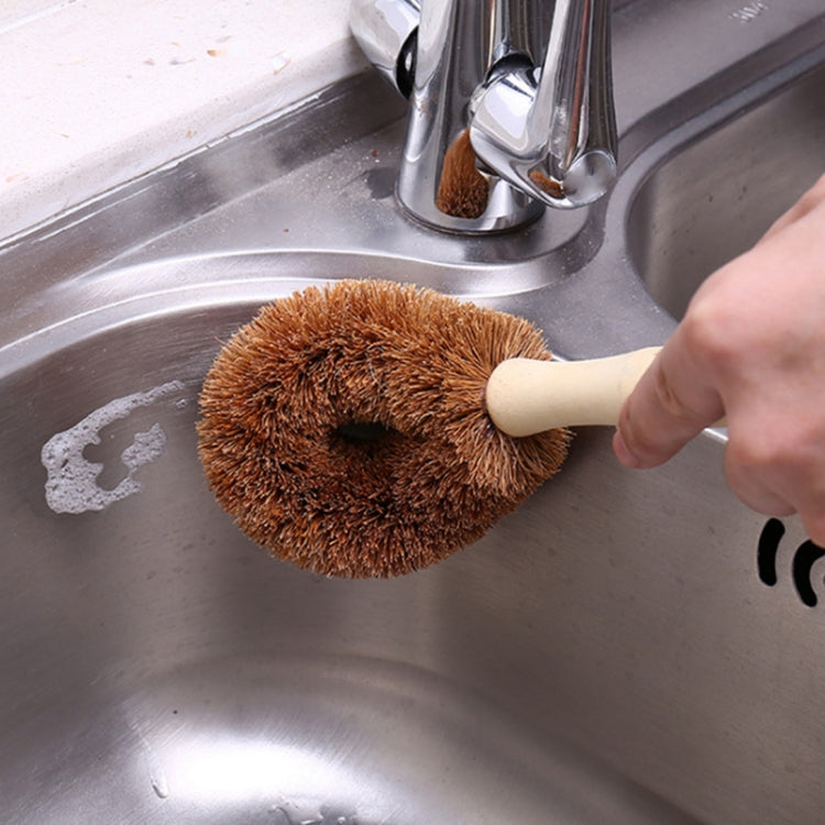 Coconut palm sink cleaning brush with brown circular bristles and light-wood handle
