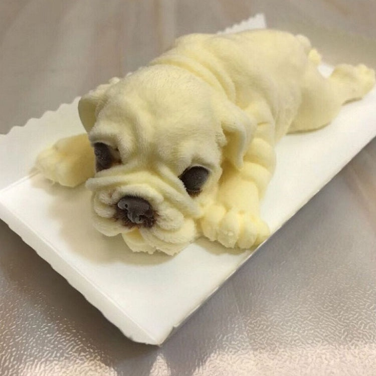 Dog-shaped molded treat on white silicone tray, pale color