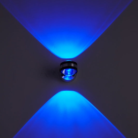 Double-sided LED wall light with black housing, blue upward and downward glow.