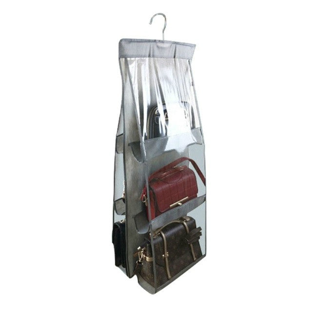 Gray hanging organizer bag with clear pockets and 3 layers holding handbags and small items